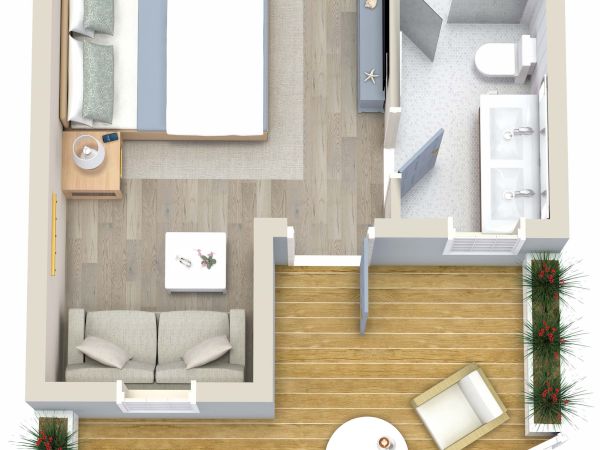 A floor plan shows a bedroom, bathroom, living area, and balcony. The bedroom has a bed and nightstands, the balcony has outdoor furniture.