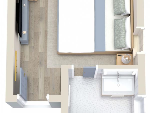 This image is a 3D floor plan showing a bedroom with a bed, side tables, a TV, and a desk, connected to a bathroom with a toilet and a shower.