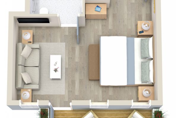 The image shows a top-down view of a small apartment layout with a bedroom, living area, bathroom, and balcony with two chairs and a table.