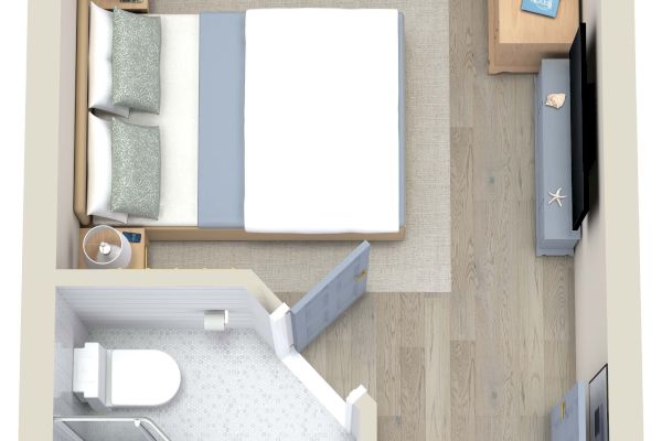 The image shows a small, furnished studio apartment with a bed, two nightstands, a TV, a dresser, and a bathroom.